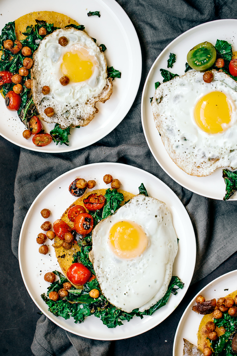 Huevos Rancheros with Charred Kale, Tomatoes, and Crispy Garlic Chickpeas